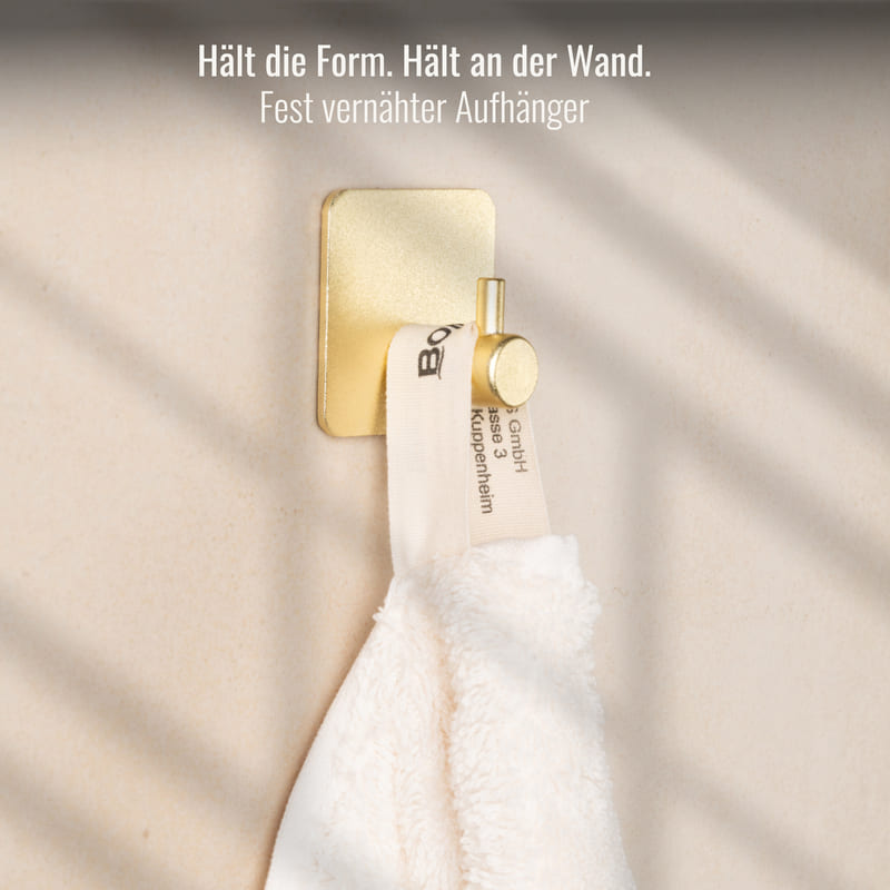 Saunatuch Beige mit stabiler Aufhängung – funktional, stilvoll und aus hochwertiger ägyptischer Baumwolle gefertigt.